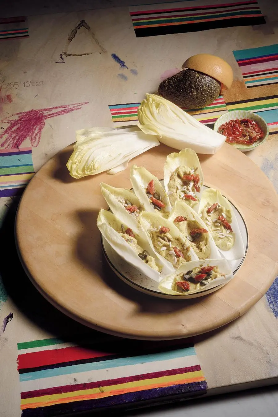 Barchette di indivia belga con crema di avocado