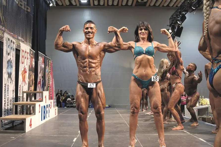 Stefano Rosa, campione di bodybuilding, con la madre Anna Colucci